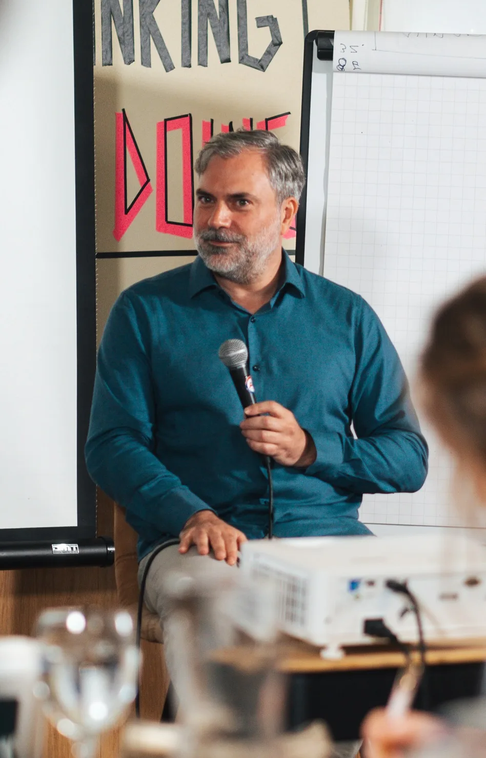 Damien Gauthier coaching a participant in a workshop